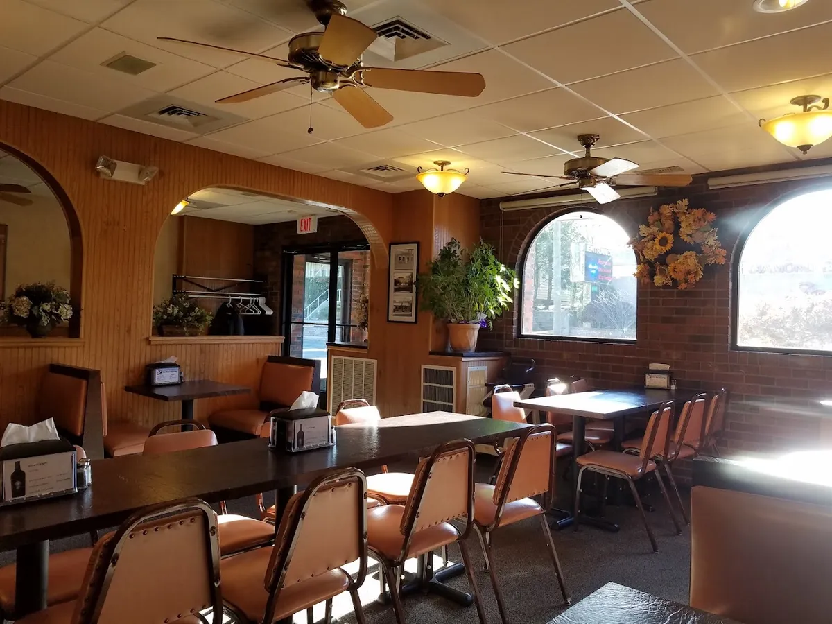 Tables and booths inside Ernie's Pizza & Restaurant